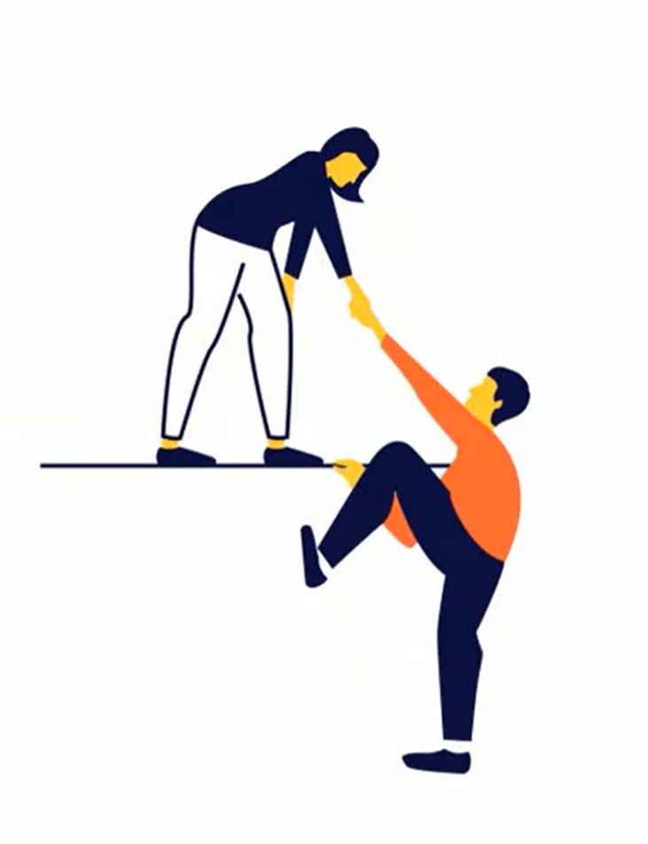 A woman who is standing on a higher surface is helping a man to get up to that level by handing out a hand for help. 
